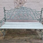 Large garden seat with a wrought iron back